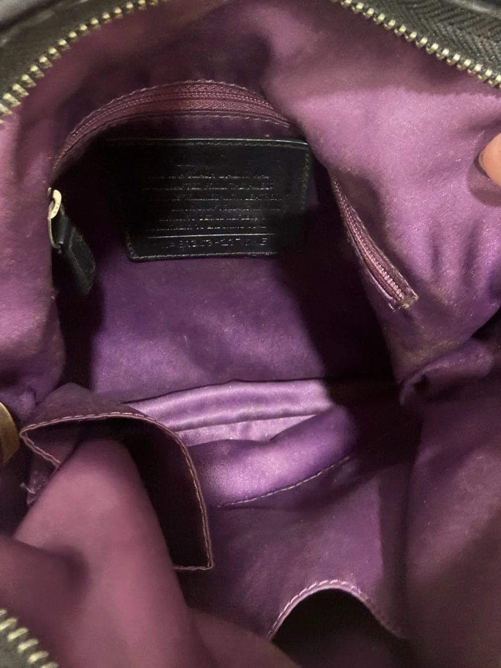 Coach shoulder bag slight fading at top of bag reflects price
